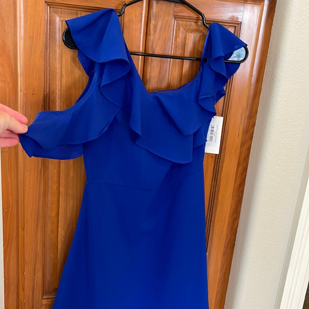 Royal blue C.Luce dress- one side has arm ruffle NWT never worn. Small